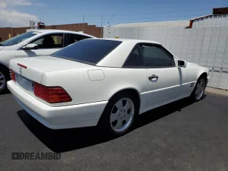 1994 Mercedes-Benz SL z VIN WDBFA63EXRF097007, wystawiony jako Copart lot #59714045 z przebiegiem Nie podano mil oraz Szkoda całkowita • Salvage title. Historia ofert i sprzedaży dostępna na DreamBid. Obrazek 3.
