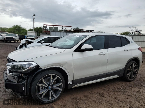 2022 BMW X2 sDrive28i with VIN WBXYH9C02N5U69017, listed as a Copart auction lot 68391504 with 5,201 mi miles and Salvage Title. Bid and sale history available at carsss.com. Image 1.