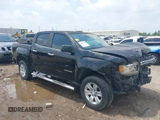 2015 GMC Canyon 2WD SLE with VIN 1GTG5BE3XF1226497, listed as a IAAI auction lot 42106960 with 97,360 mi miles and . Bid and sale history available at carsss.com. Image 1.