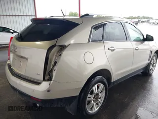 2013 Cadillac SRX Performance Collection z VIN 3GYFNCE31D5611616, wystawiony jako IAAI lot #42119169 z przebiegiem 159 019 mil mil oraz . Historia ofert i sprzedaży dostępna na DreamBid. Obrazek 4.