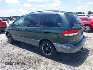 2002 Toyota Sienna LE with VIN 4T3ZF13C82U465948, listed as a IAAI auction lot 42264013 with 228,864 mi miles and . Bid and sale history available at DreamBid. Image 3.
