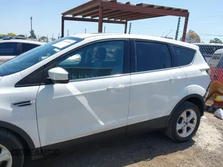 2015 Ford Escape SE with VIN 1FMCU0G91FUC65044, listed as a IAAI auction lot 42083688 with 111,972 mi miles and . Bid and sale history available at carsss.com. Image 15.