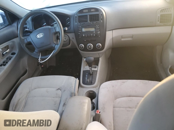 2008 Kia Spectra EX with VIN KNAFE122885583042, listed as a Copart auction lot 83485024 with 171,795 mi miles and Salvage title. Bid and sale history available at DreamBid. Image 8.