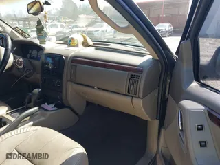 2002 Jeep Grand Cherokee Limited with VIN 1J4GW58N62C308103, listed as a IAAI auction lot 41760396 with 247,152 mi miles. Bid and sale history available at carsss.com. Image 5.