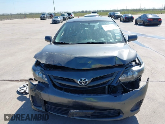 2012 Toyota Corolla L with VIN 2T1BU4EE9CC831743, listed as a IAAI auction lot 41870966 with 166,548 mi miles. Bid and sale history available at carsss.com. Image 12.