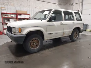 1994 Isuzu Trooper z VIN JACDH58V9R7919182, wystawiony jako IAAI lot #42333093 z przebiegiem 192 819 mil mil oraz . Historia ofert i sprzedaży dostępna na DreamBid. Obrazek 17.