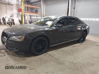 2012 Audi A8 z VIN WAURVAFD6CN014546, wystawiony jako IAAI lot #41357932 z przebiegiem 93 516 mil mil oraz . Historia ofert i sprzedaży dostępna na DreamBid. Obrazek 2.