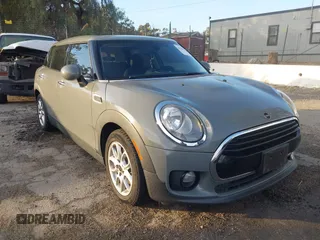 2019 MINI Clubman Cooper with VIN WMWLN5C59K2G82399, listed as a IAAI auction lot 41349514 with 64,235 mi miles and . Bid and sale history available at DreamBid. Image 1.