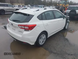 2018 Subaru Impreza Premium with VIN 4S3GTAB61J3729332, listed as a IAAI auction lot 41696550 with 85,035 mi miles. Bid and sale history available at carsss.com. Image 4.