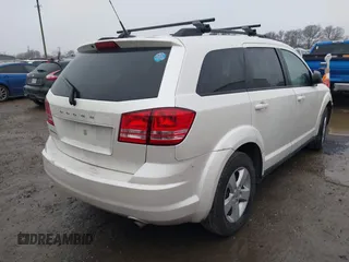 2016 Dodge Journey SE with VIN 3C4PDCAB6GT250263, listed as a IAAI auction lot 41436271 with 162,879 mi miles and . Bid and sale history available at DreamBid. Image 4.