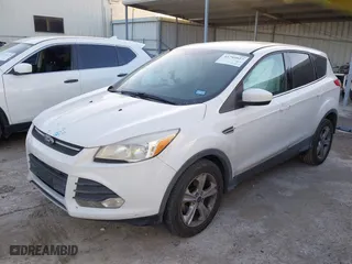 2014 Ford Escape SE with VIN 1FMCU0GX8EUB31399, listed as a IAAI auction lot 41795927 with 129,963 mi miles. Bid and sale history available at carsss.com. Image 2.
