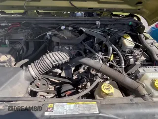 2008 Jeep Wrangler X z VIN 1J4FA24138L627219, wystawiony jako Copart lot #90665705 z przebiegiem 148 473 mil mil oraz Czysty tytuł • Clean title. Historia ofert i sprzedaży dostępna na DreamBid. Obrazek 11.