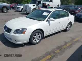 2006 Nissan Altima SE with VIN 1N4BL11D76N458904, listed as a IAAI auction lot 42421934 with 152,604 mi miles and . Bid and sale history available at DreamBid. Image 2.