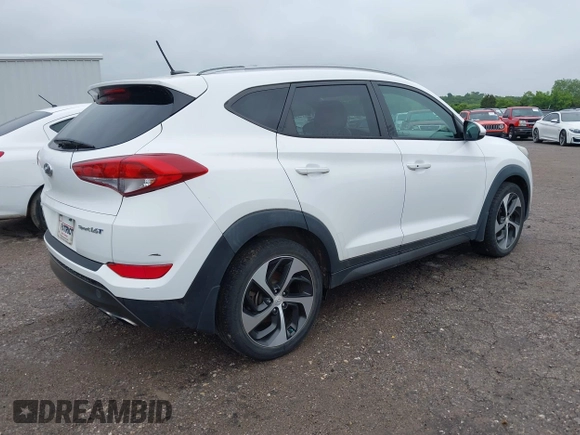 2016 Hyundai Tucson Limited with VIN KM8J33A23GU215481, listed as a IAAI auction lot 42202341 with 97,693 mi miles. Bid and sale history available at carsss.com. Image 4.