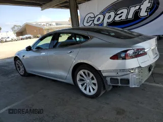 2016 Tesla Model S 90D with VIN 5YJSA1E24GF178298, listed as a Copart auction lot 52799545 with 112,391 mi miles and Salvage Title. Bid and sale history available at DreamBid. Image 2.