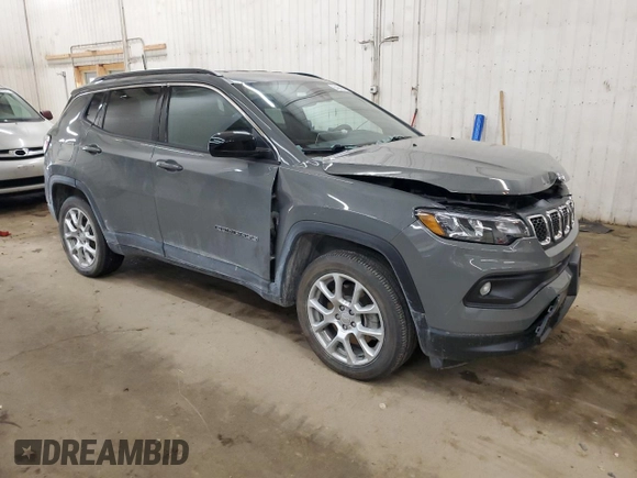 2023 Jeep Compass Latitude Lux with VIN 3C4NJDFN3PT569886, listed as a Copart auction lot 54680145 with 13,633 mi miles and Salvage title. Bid and sale history available at DreamBid. Image 4.