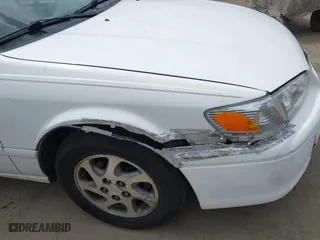 2000 Toyota Camry CE with VIN JT2BG22K3Y0406082, listed as a IAAI auction lot 42053116 with 171,219 mi miles. Bid and sale history available at carsss.com. Image 14.