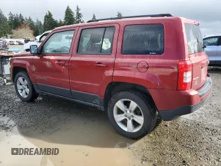 2014 Jeep Patriot Latitude with VIN 1C4NJRFB1ED651525, listed as a Copart auction lot 52526975 with 135,088 mi miles and Salvage Title. Bid and sale history available at carsss.com. Image 2.