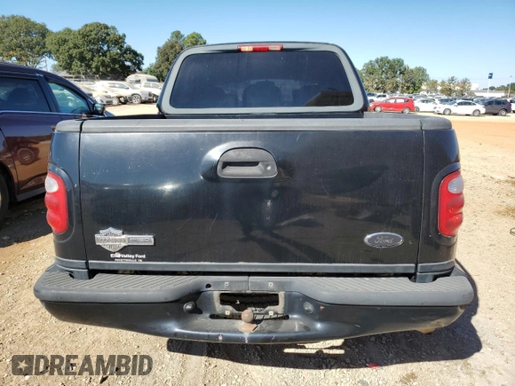 2002 Ford F-150 Harley Davidson with VIN 1FTRW07332KD46296, listed as a Copart auction lot 76333404 with 160,616 mi miles and Salvage Title. Bid and sale history available at carsss.com. Image 6.