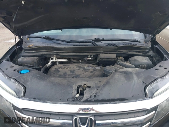 2016 Honda Pilot EX-L with VIN 5FNYF6H5XGB031594, listed as a IAAI auction lot 40409867 with 132,227 mi miles. Bid and sale history available at carsss.com. Image 10.