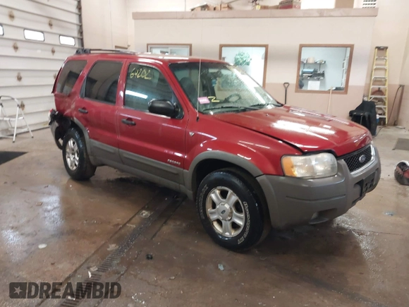 2001 Ford Escape XLT with VIN 1FMYU04101KF46809, listed as a IAAI auction lot 41664202 with 256,468 mi miles. Bid and sale history available at carsss.com. Image 1.