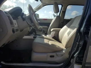 2009 Mercury Mariner Premier with VIN 4M2CU97729KJ06468, listed as a Copart auction lot 47785335 with 86,497 mi miles and Salvage Title. Bid and sale history available at carsss.com. Image 7.