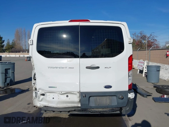 2016 Ford Transit Cargo z VIN 1FTYR1YM3GKA01650, wystawiony jako IAAI lot #41242238 z przebiegiem 145 073 mil mil oraz . Historia ofert i sprzedaży dostępna na DreamBid. Obrazek 17.