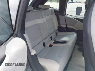 2014 BMW i3 z VIN WBY1Z4C56EVX63285, wystawiony jako IAAI lot #41672245 z przebiegiem 70 229 mil mil oraz . Historia ofert i sprzedaży dostępna na DreamBid. Obrazek 8.