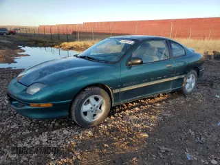 1997 Pontiac Sunfire SE z VIN 1G2JB12T9V7579374, wystawiony jako Copart lot #41468144 z przebiegiem 153 533 mil mil oraz Tytuł czysty. Historia ofert i sprzedaży dostępna na DreamBid. Obrazek 1.