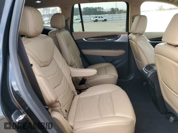 2023 Cadillac XT6 AWD Sport with VIN 1GYKPHRS3PZ150630, listed as a Copart auction lot 43557595 with 54,299 mi miles and Salvage title. Bid and sale history available at DreamBid. Image 11.