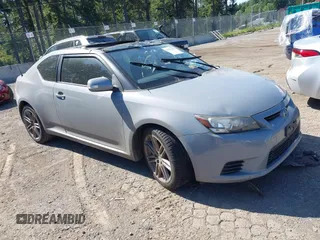 2013 Scion tC z VIN JTKJF5C7XD3065251, wystawiony jako IAAI lot #42372320 z przebiegiem Nie podano mil oraz . Historia ofert i sprzedaży dostępna na DreamBid. Obrazek 1.