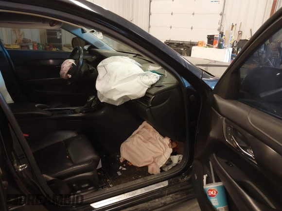2014 Cadillac ATS Standard AWD with VIN 1G6AG5RXXE0124736, listed as a IAAI auction lot 42091338 with 185,168 mi miles and . Bid and sale history available at DreamBid. Image 5.