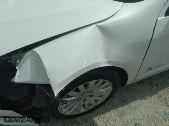 2010 Ford Fusion Hybrid z VIN 3FADP0L31AR387443, wystawiony jako IAAI lot #40034145 z przebiegiem 153 847 mil mil oraz . Historia ofert i sprzedaży dostępna na DreamBid. Obrazek 13.