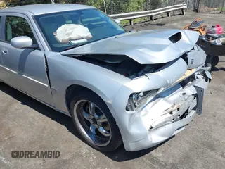 2006 Dodge Charger R/T with VIN 2B3KA53H56H513111, listed as a IAAI auction lot 41977236 with 173,048 mi miles and . Bid and sale history available at carsss.com. Image 12.