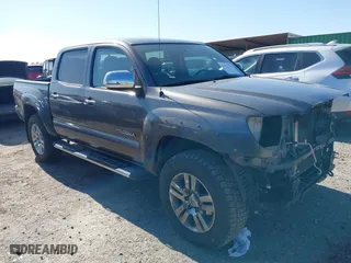 2013 Toyota Tacoma PreRunner with VIN 5TFJU4GN2DX031877, listed as a IAAI auction lot 41532757 with 176,797 mi miles. Bid and sale history available at carsss.com. Image 1.
