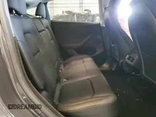 2023 Tesla Model Y Long Range z VIN 7SAYGDEE3PF862038, wystawiony jako Copart lot #57639325 z przebiegiem 11 020 mil mil oraz Szkoda całkowita • Salvage title. Historia ofert i sprzedaży dostępna na DreamBid. Obrazek 11.