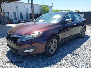 2011 Kia Optima EX with VIN KNAGN4A79B5129697, listed as a IAAI auction lot 42039540 with 226,627 mi miles and . Bid and sale history available at carsss.com. Image 2.