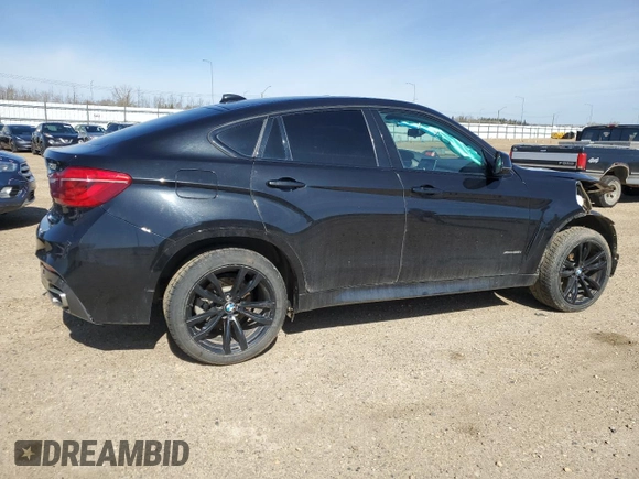 2018 BMW X6 xDrive35i z VIN 5UXKU2C52J0X51407, wystawiony jako Copart lot #54449325 z przebiegiem 125 767 mil mil oraz Szkoda całkowita • Salvage title. Historia ofert i sprzedaży dostępna na DreamBid. Obrazek 3.