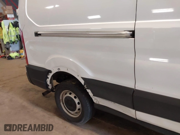 2021 Ford Transit Cargo with VIN 1FTBR1Y87MKA76372, listed as a IAAI auction lot 42251675 with 98,072 mi miles and . Bid and sale history available at DreamBid. Image 6.