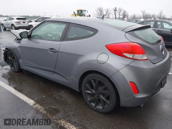 2017 Hyundai Veloster with VIN KMHTC6AD4HU309625, listed as a IAAI auction lot 41933497 with 184,632 mi miles. Bid and sale history available at carsss.com. Image 3.