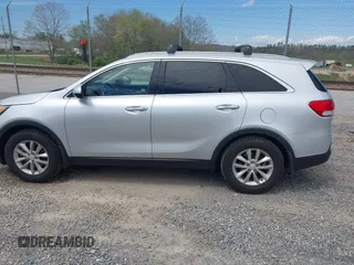 2016 Kia Sorento LX with VIN 5XYPG4A35GG048897, listed as a IAAI auction lot 41986578 with 161,157 mi miles. Bid and sale history available at carsss.com. Image 14.