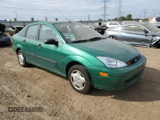 2002 Ford Focus LX with VIN 1FAFP33PX2W150929, listed as a Copart auction lot 71664474 with 61,505 mi miles and Salvage Title. Bid and sale history available at DreamBid. Image 4.