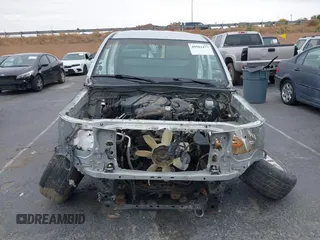 2007 Toyota Tacoma with VIN 3TMLU42N67M010248, listed as a IAAI auction lot 40982477 with Not provided miles and . Bid and sale history available at DreamBid. Image 12.