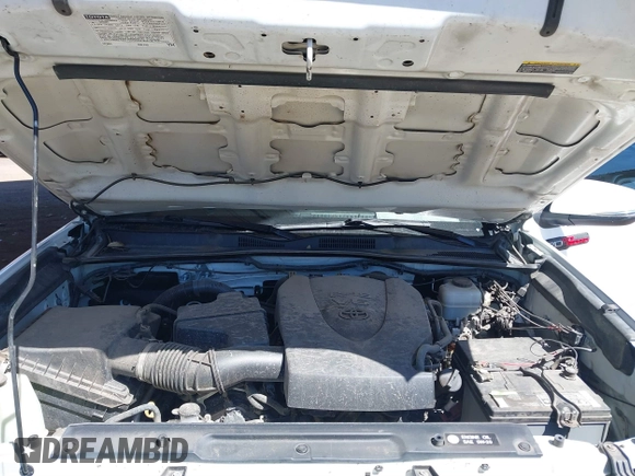 2016 Toyota Tacoma SR with VIN 5TFCZ5ANXGX028464, listed as a IAAI auction lot 41834385 with 124,407 mi miles and . Bid and sale history available at DreamBid. Image 10.