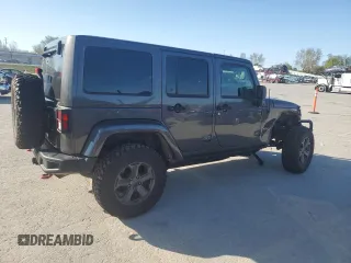 2017 Jeep Wrangler Unlimited Rubicon z VIN 1C4BJWFGXHL737844, wystawiony jako Copart lot #53044635 z przebiegiem 49 286 mil mil oraz Czysty tytuł • Clean title. Historia ofert i sprzedaży dostępna na DreamBid. Obrazek 3.