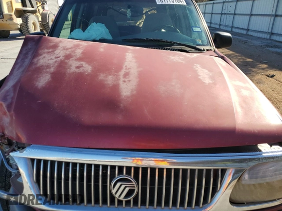 1997 Mercury Mountaineer z VIN 4M2DU52P2VUJ06487, wystawiony jako Copart lot #81775164 z przebiegiem 158 628 mil mil oraz Szkoda całkowita • Salvage title. Historia ofert i sprzedaży dostępna na DreamBid. Obrazek 12.