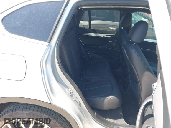 2021 BMW X1 sDrive28i with VIN WBXJG7C06M5T14235, listed as a IAAI auction lot 42021762 with 53,384 mi miles and . Bid and sale history available at DreamBid. Image 8.