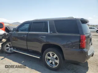 2015 Chevrolet Tahoe LTZ with VIN 1GNSKCKC2FR157035, listed as a Copart auction lot 59990415 with Not provided miles and Salvage title. Bid and sale history available at DreamBid. Image 2.