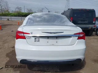 2011 Chrysler 200 Touring with VIN 1C3BC1FB4BN614249, listed as a IAAI auction lot 42041630 with 197,101 mi miles. Bid and sale history available at carsss.com. Image 16.