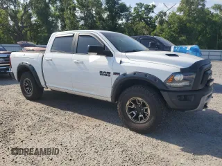 2016 Ram 1500 Rebel z VIN 1C6RR7YT7GS255707, wystawiony jako Copart lot #53700095 z przebiegiem 103 989 mil mil oraz Szkoda całkowita • Salvage title. Historia ofert i sprzedaży dostępna na DreamBid. Obrazek 4.